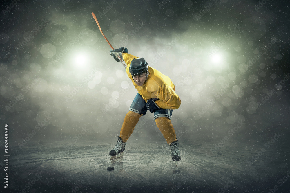 Ice hockey player on the ice, outdoors