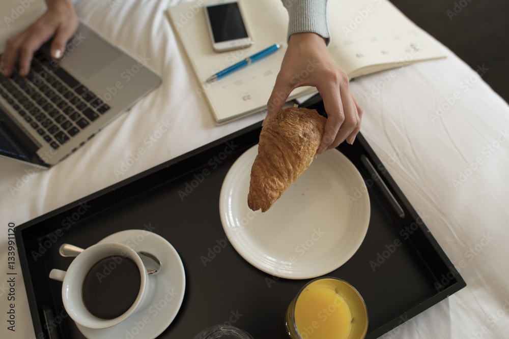 Women are having a simple breakfast at the hotel