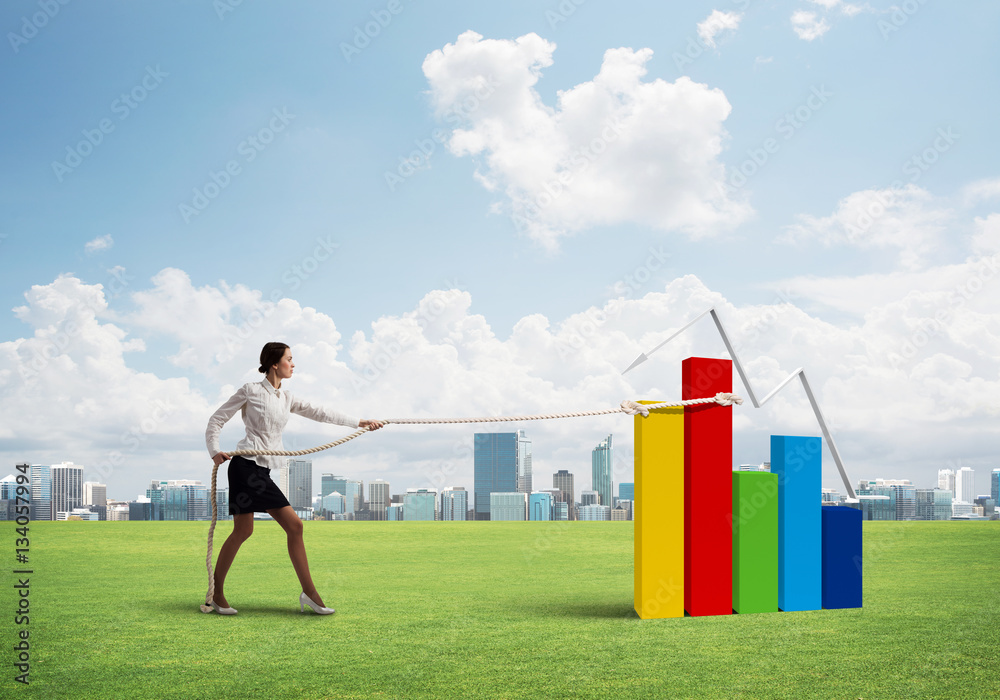 Businesswoman pulling arrow with rope and making it raise up