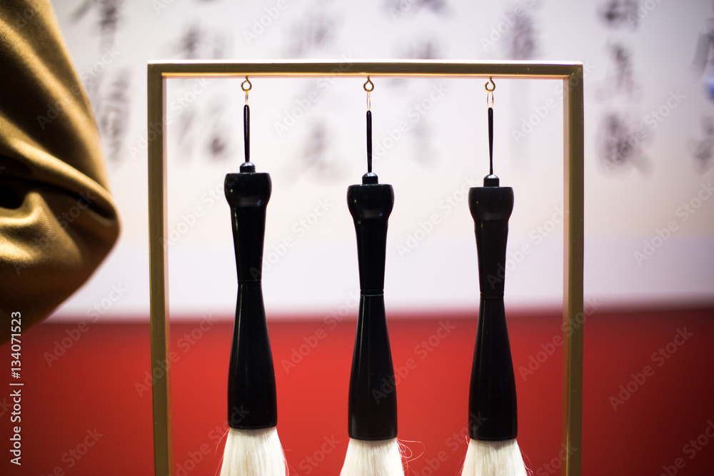 hanging calligraphy brushes on steel frame