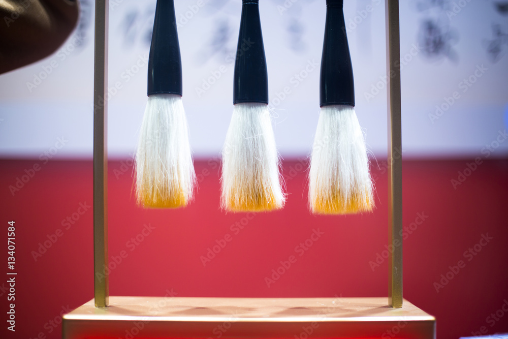 hanging calligraphy brushes on steel frame