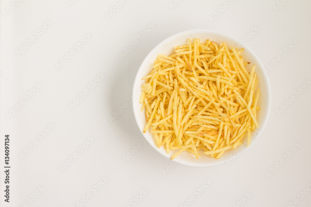 Potato Sticks into a bowl