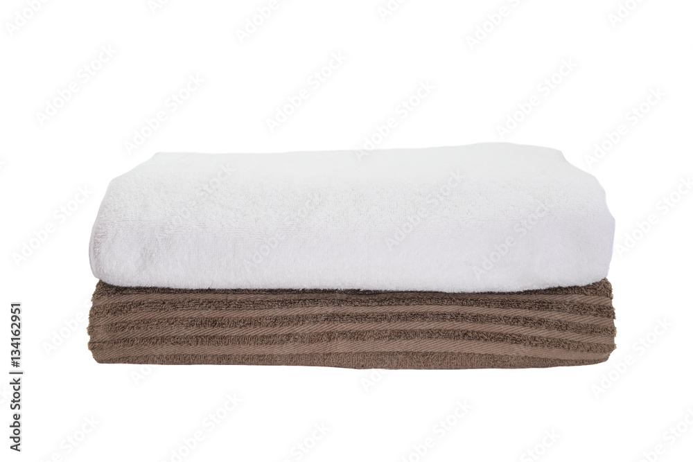 Stack of white towel and brown towel isolated on white background