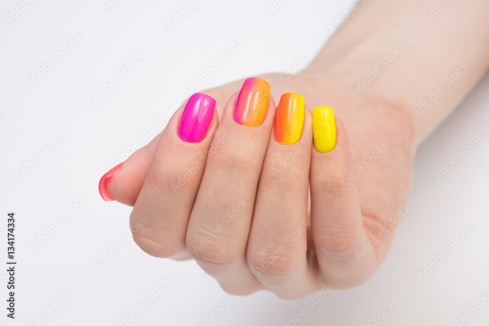 Amazing manicure and natural nails with gel polish. Attractive modern nail art design.