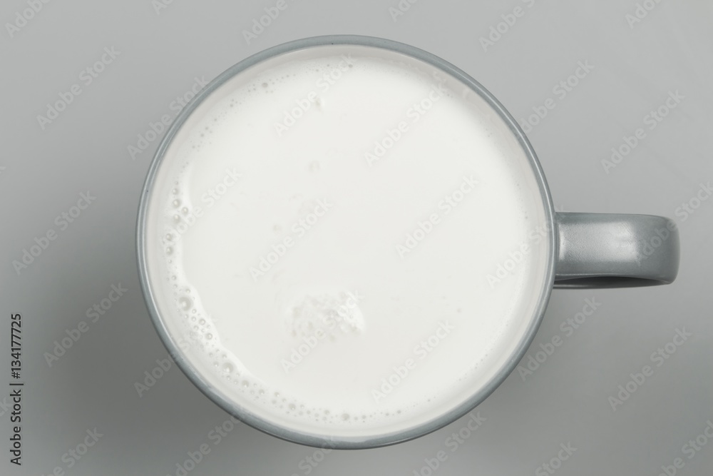 top view of glass milk / Glass of Milk From Above / gray tone