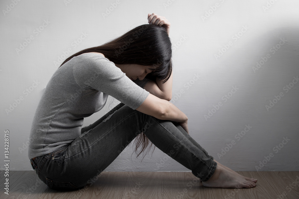 depression woman sit on floor