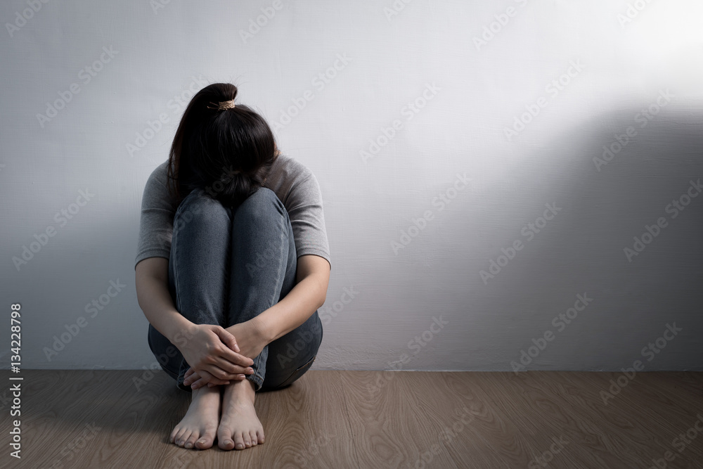 depression woman sit on floor