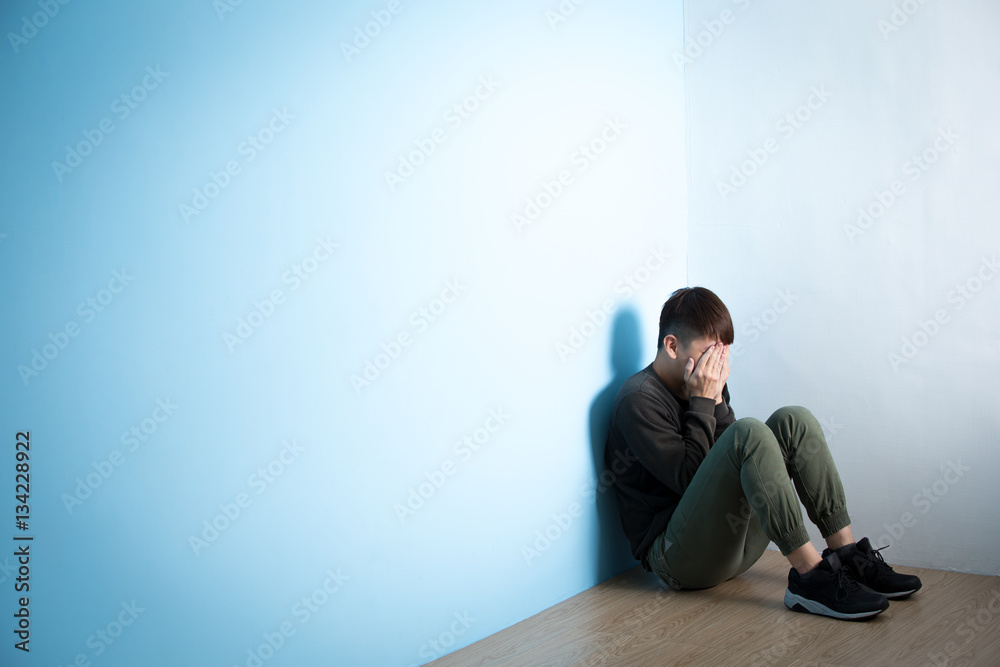 depression man sit on floor