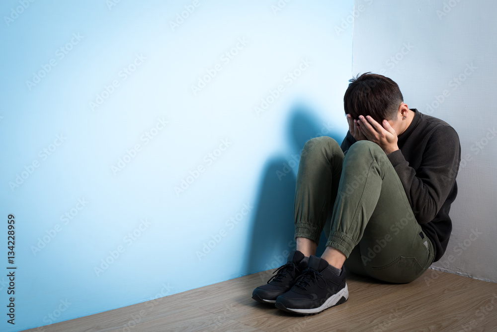 depression man sit on floor