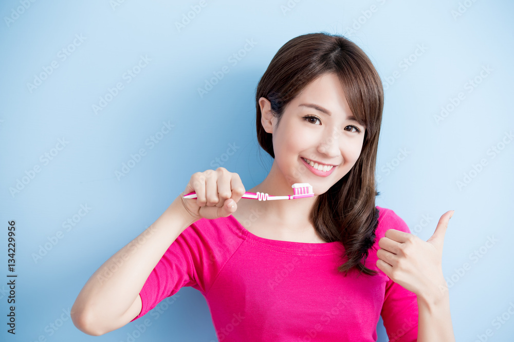 beauty woman brush her teeth