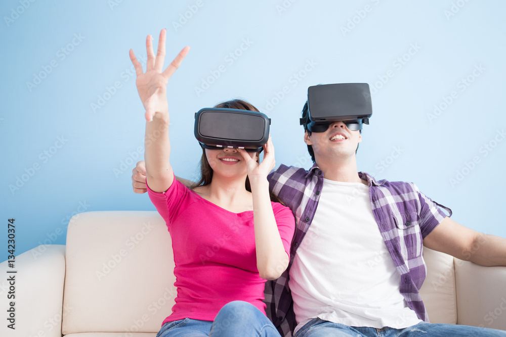 young couple play vr game