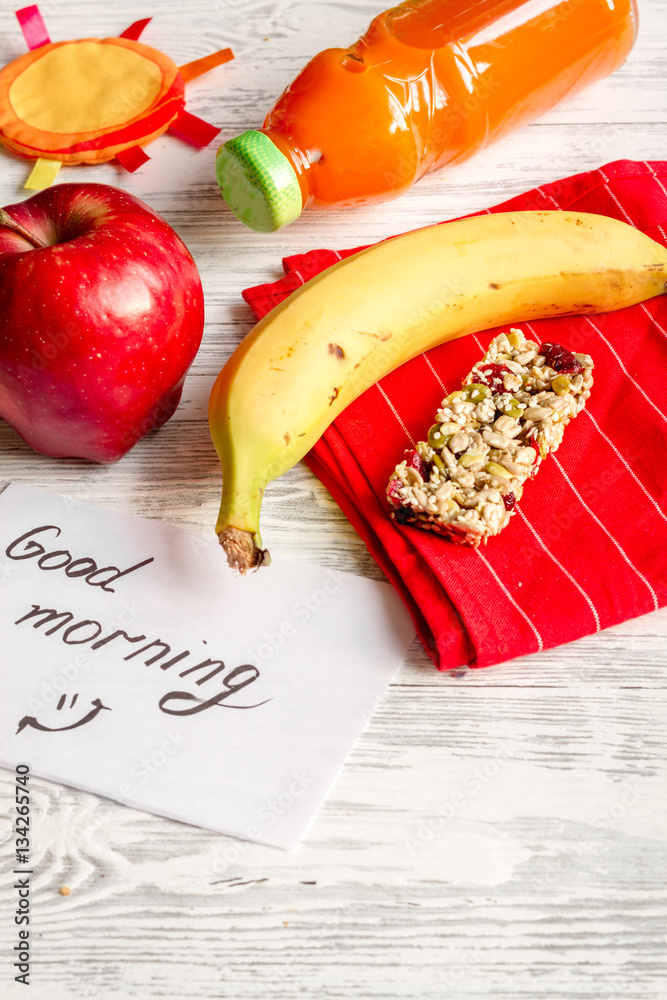 lunch box for kid with fresh vegetables on wooden background