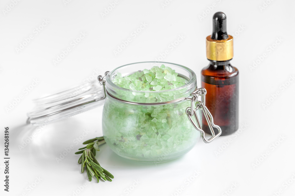 organic cosmetics with extracts of herbs rosemary on white background