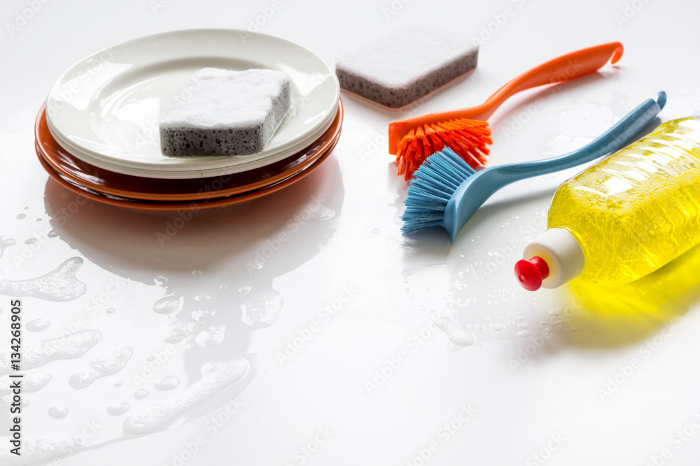 concept of washing dishes on white background