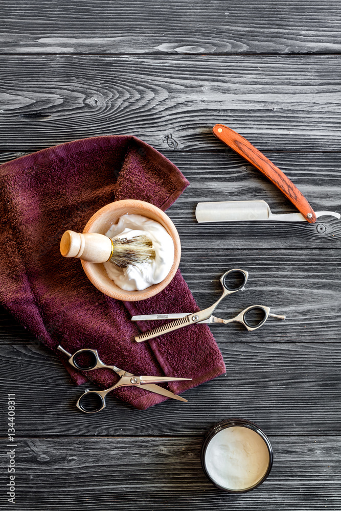 Tools for cutting beard barbershop top view on wooden background