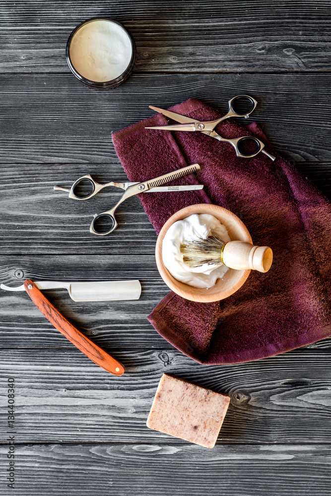 Tools for cutting beard barbershop top view on wooden background