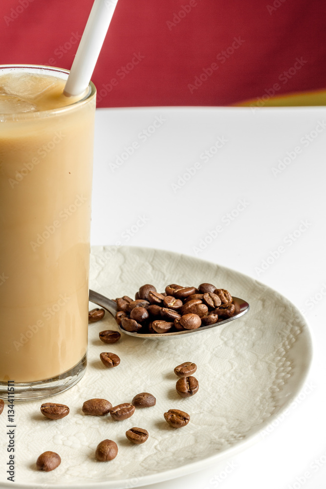 coffee with ice in glass on white background