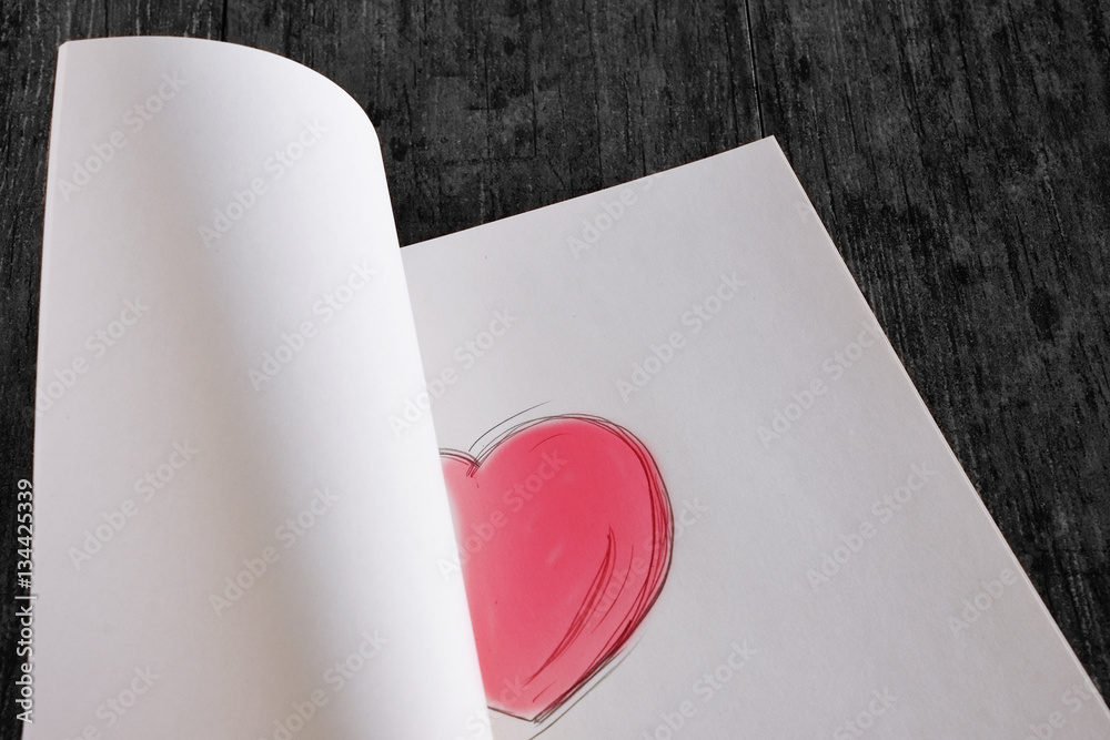 Red heart painted on Notebook