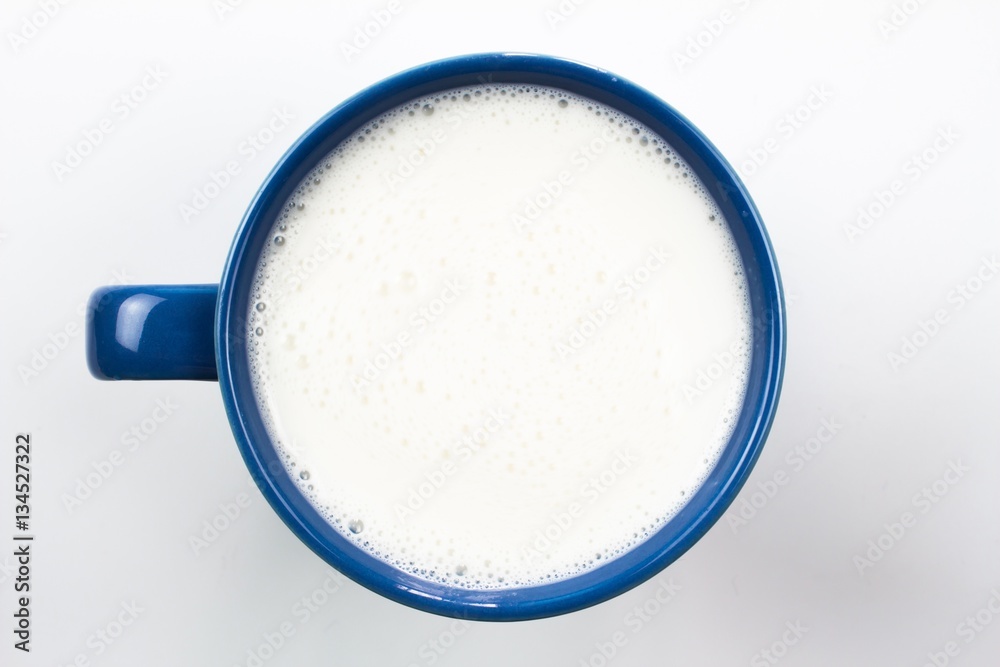 top view of glass milk / Blue glass of Milk From Above / gray tone