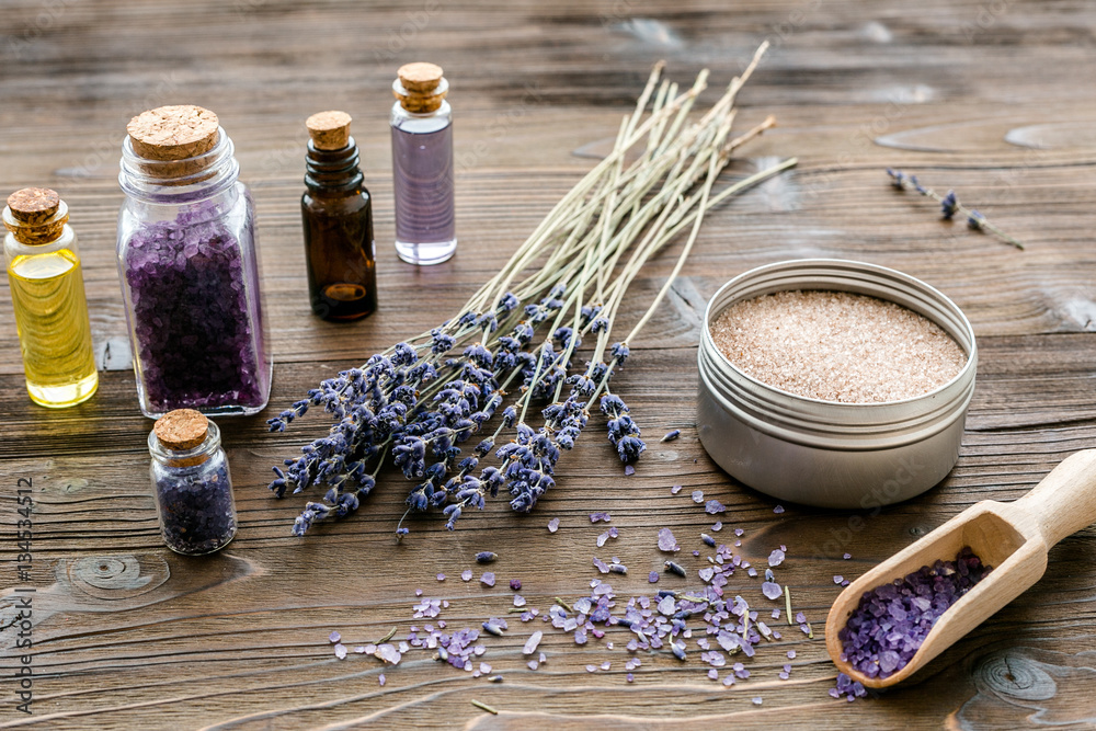 organic cosmetics with lavender on wooden background