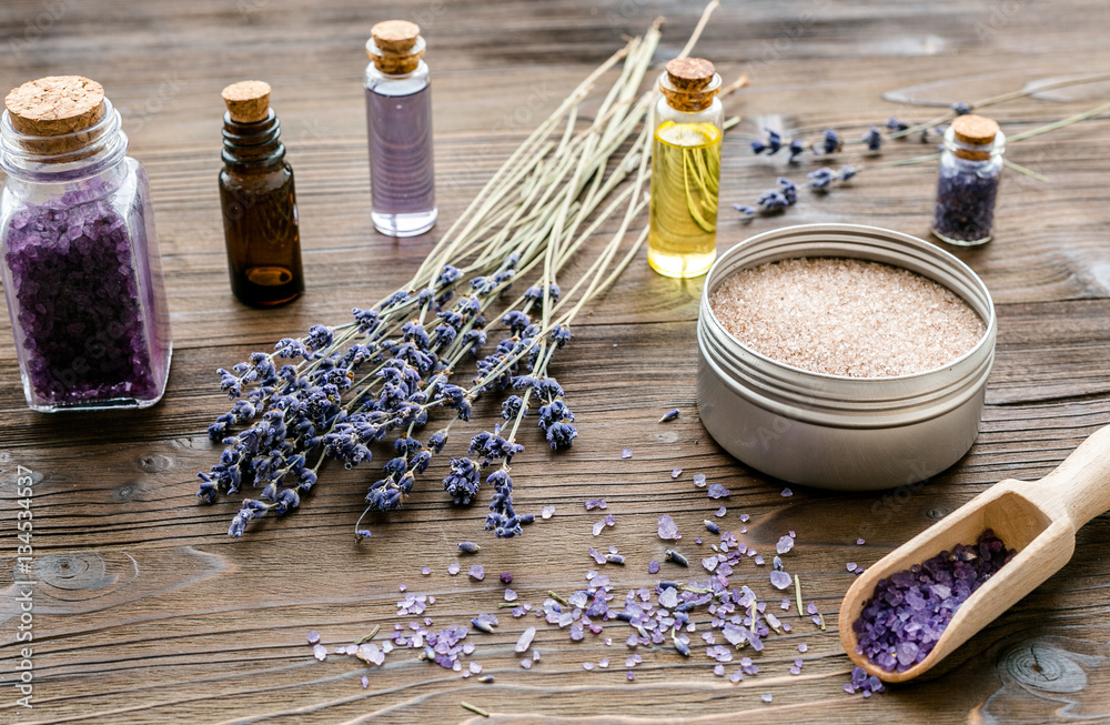 organic cosmetics with lavender on wooden background