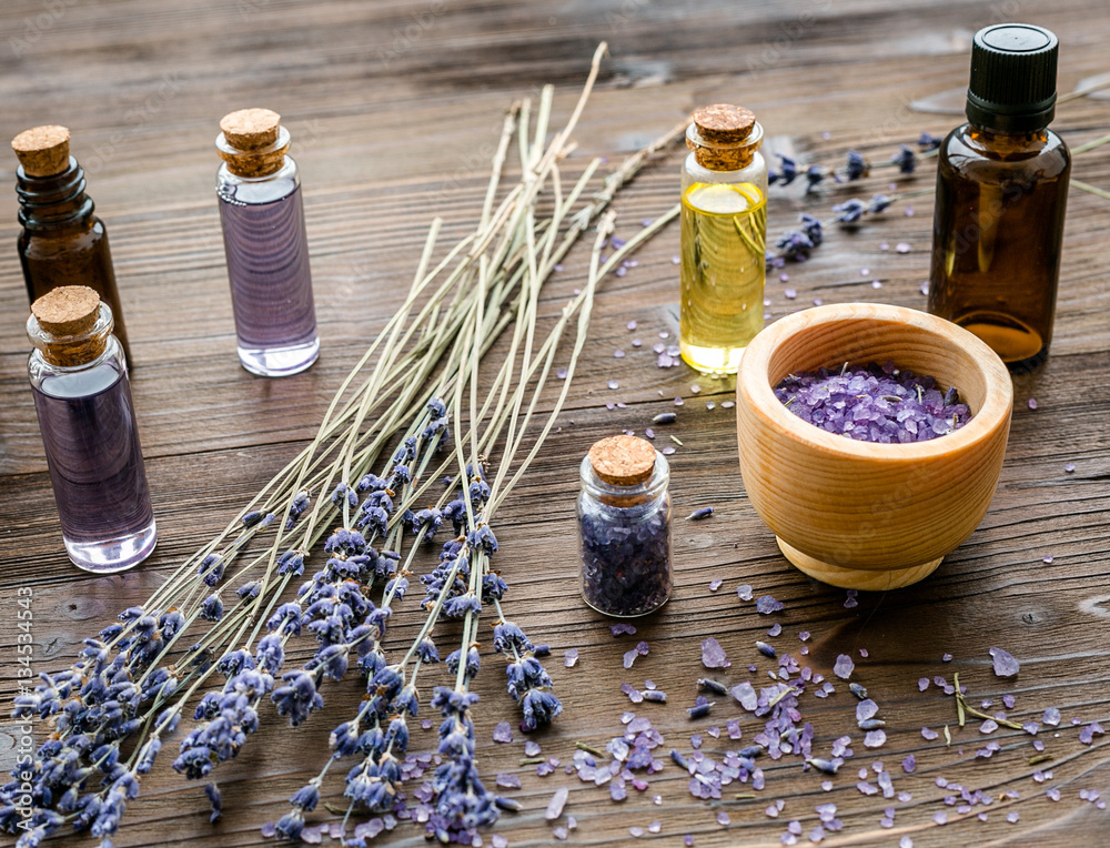 organic cosmetics with lavender on wooden background