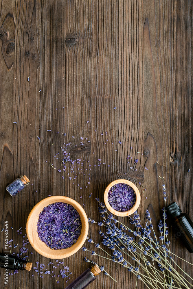 organic cosmetics with lavender on wooden background top view