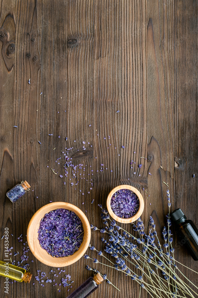 organic cosmetics with lavender on wooden background top view