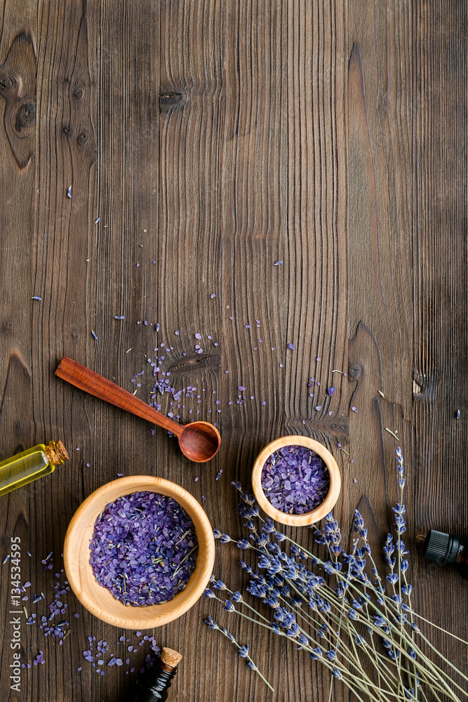 organic cosmetics with lavender on wooden background top view