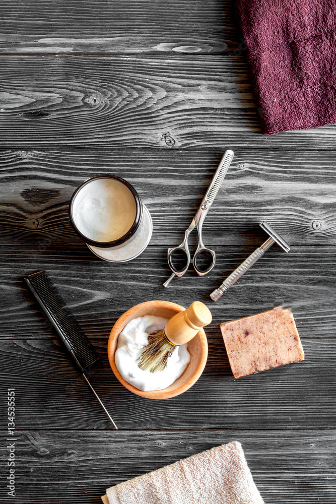 Tools for cutting beard barbershop top view on wooden background