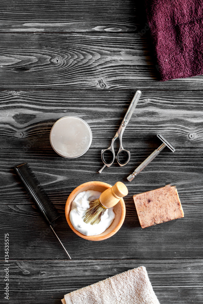 Tools for cutting beard barbershop top view on wooden background