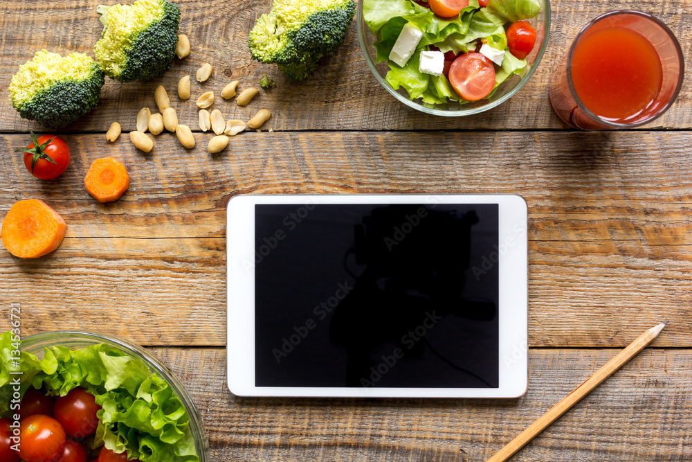 concept diet and tablet with vegetables mock up