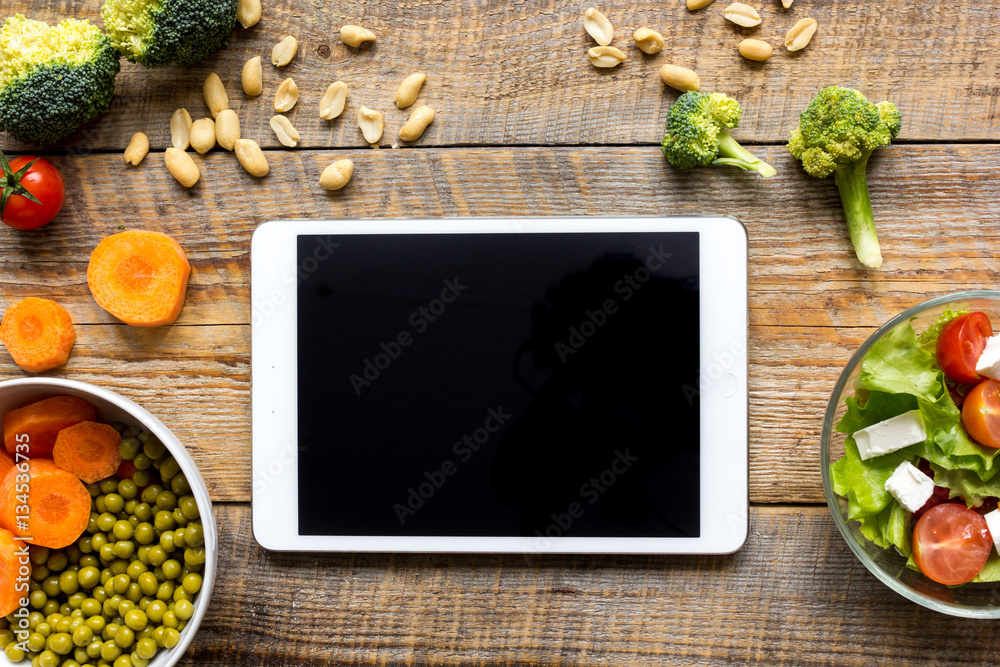 concept diet and tablet with vegetables mock up