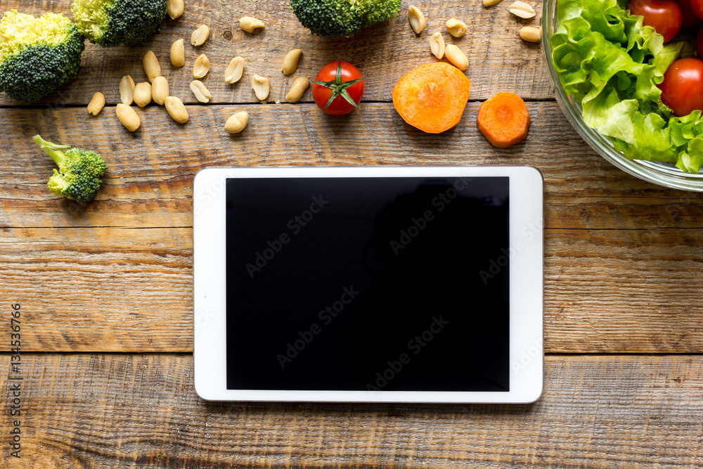 concept diet and tablet with vegetables mock up