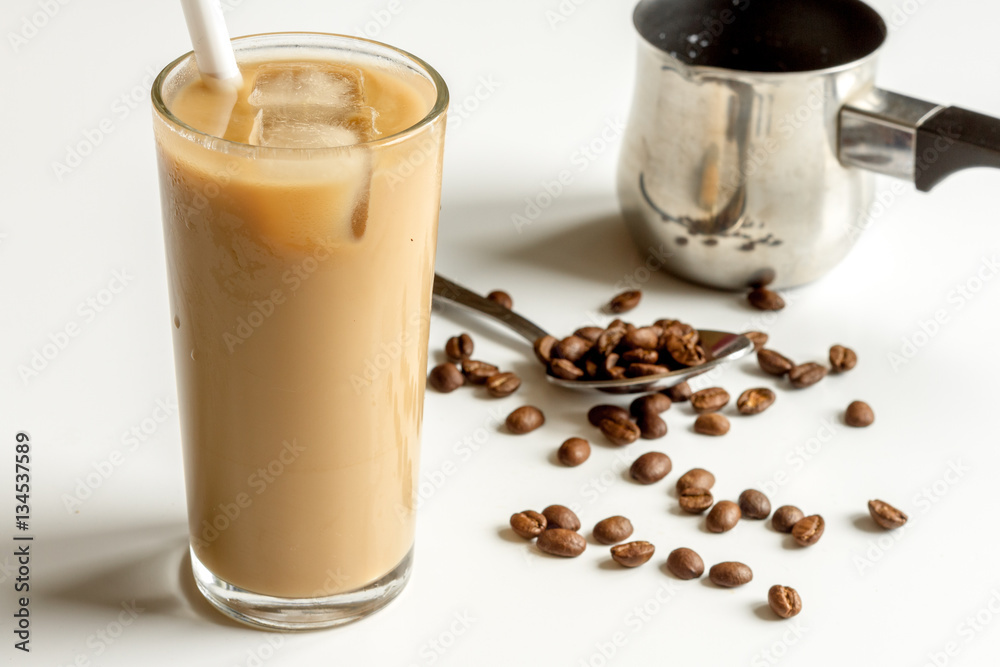 coffee with ice in glass on white background