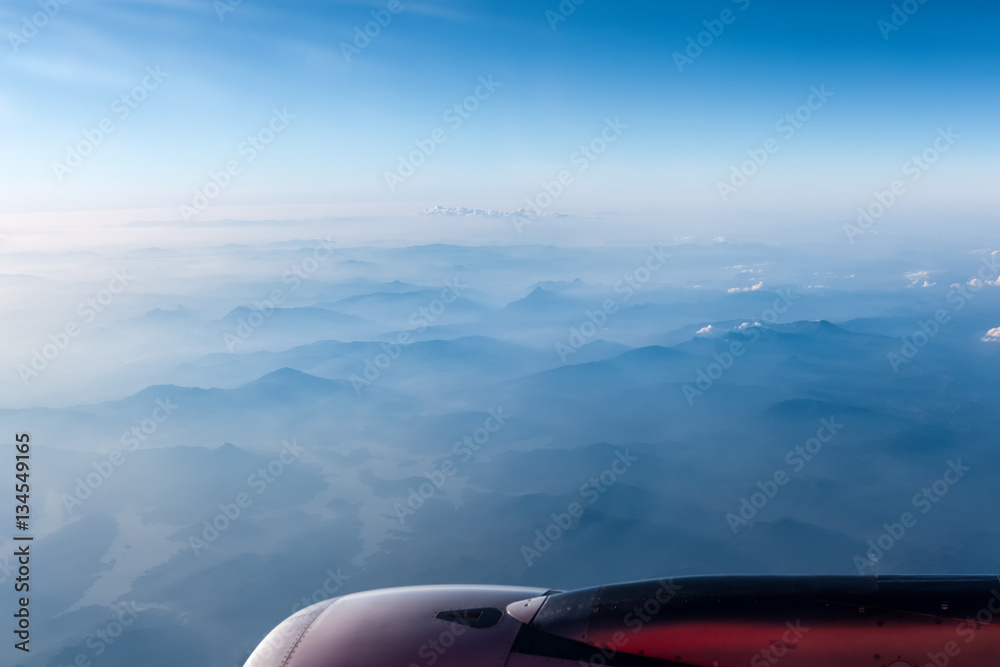 aircraft engine above the mountain ranges