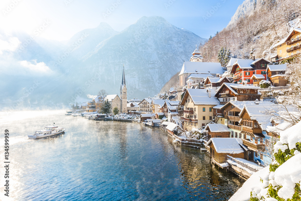 Classic view of Hallstatt with ship in winter, Salzkammergut, Austria