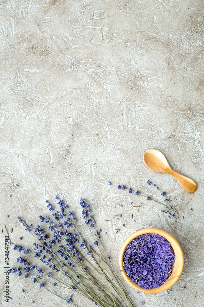 Essential oil and lavender salt with flowers top view