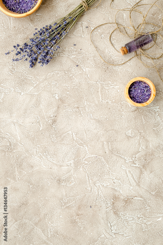 Essential oil and lavender salt with flowers top view