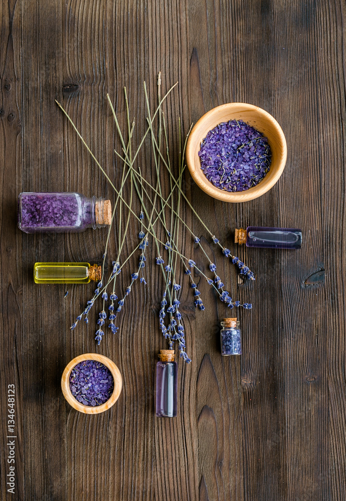 organic cosmetics with lavender on wooden background top view