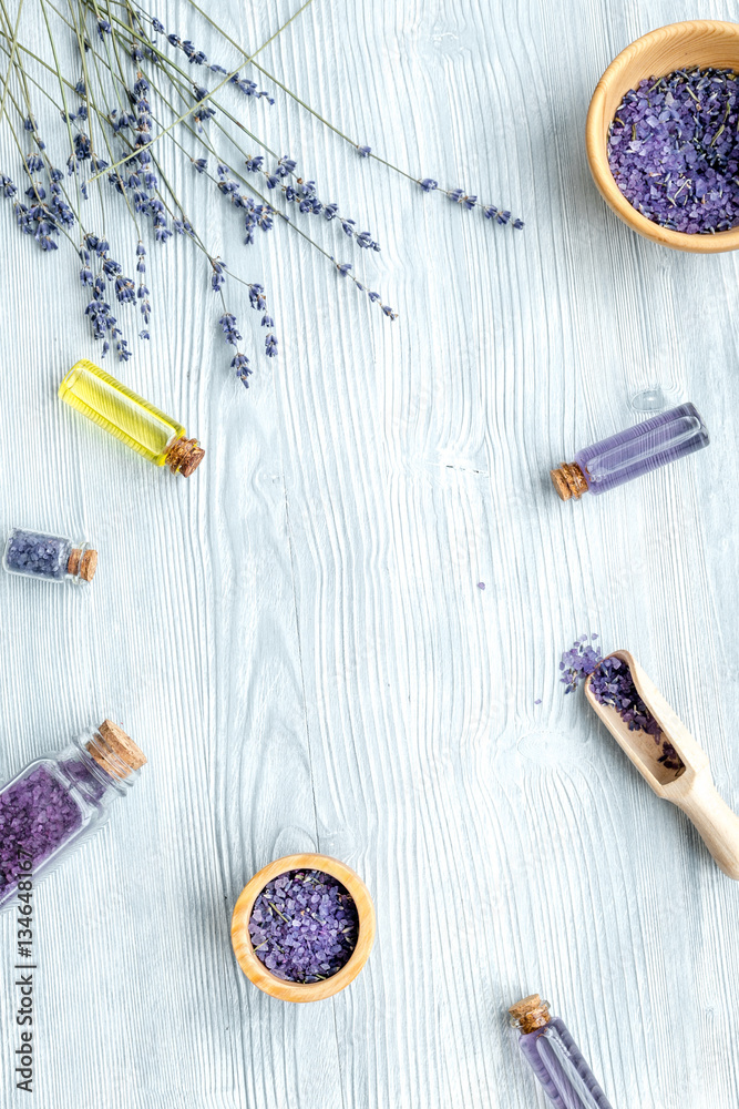 organic cosmetics with lavender on wooden background top view