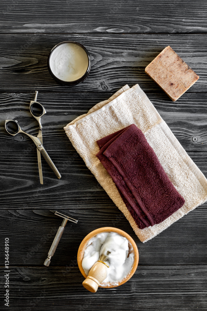 Tools for cutting beard barbershop top view on wooden background