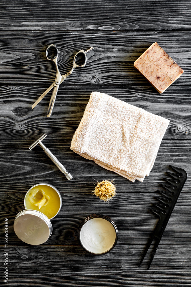 Tools for cutting beard barbershop top view on wooden background