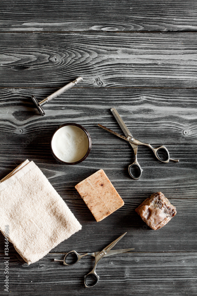 Tools for cutting beard barbershop top view on wooden background