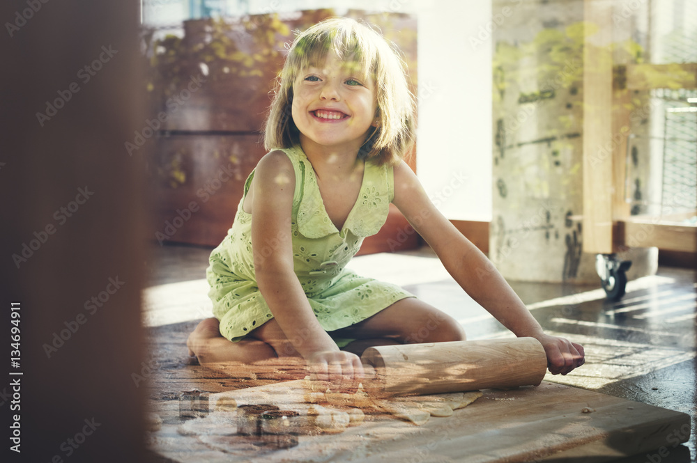 Little Girl Smiling Bake Cookie Concept