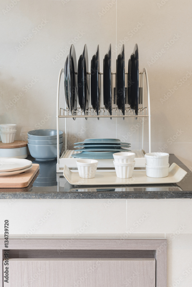 modern kitchen room with sink on top granite counter