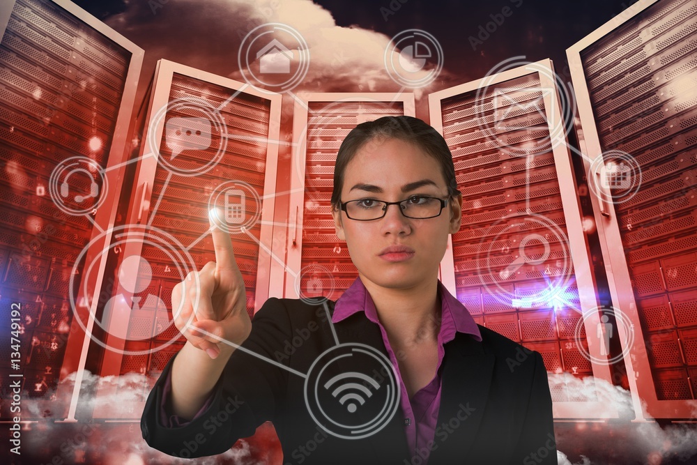 Composite image of serious businesswoman pointing