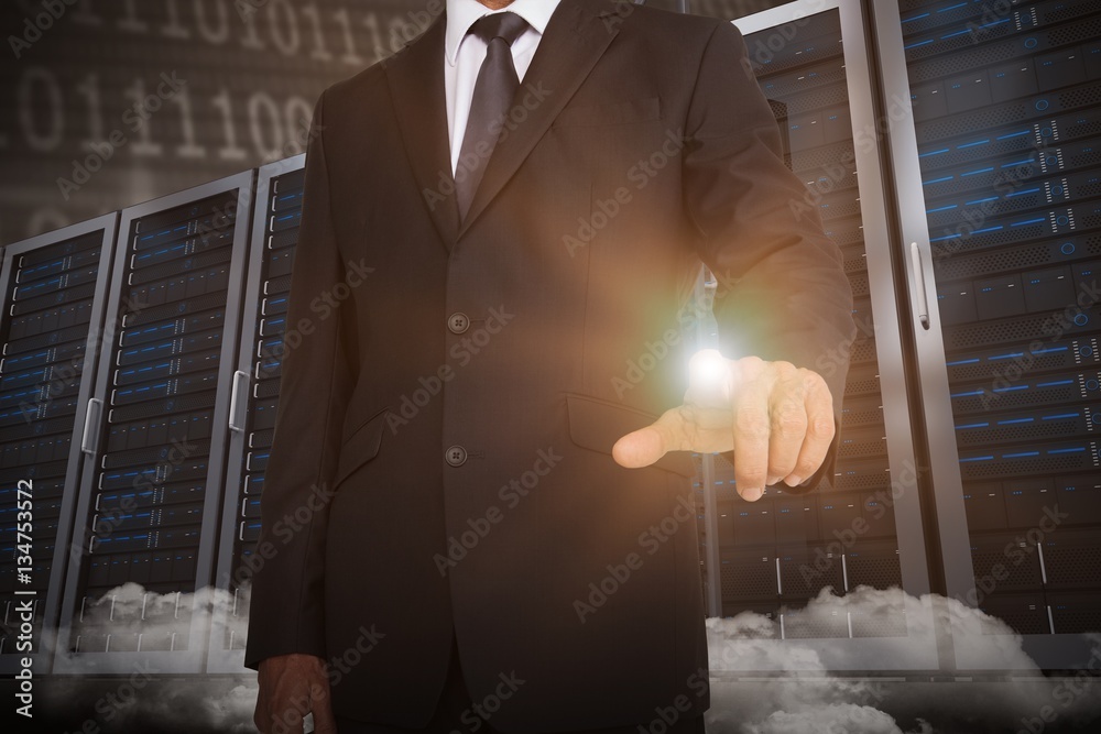 Composite image of businessman pointing