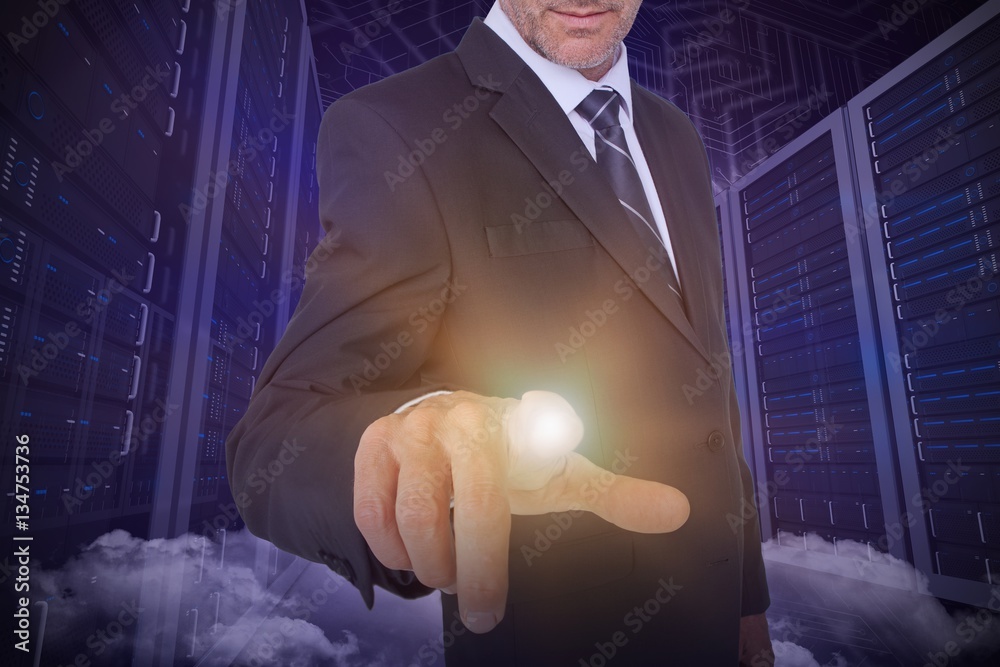 Composite image of businessman pointing