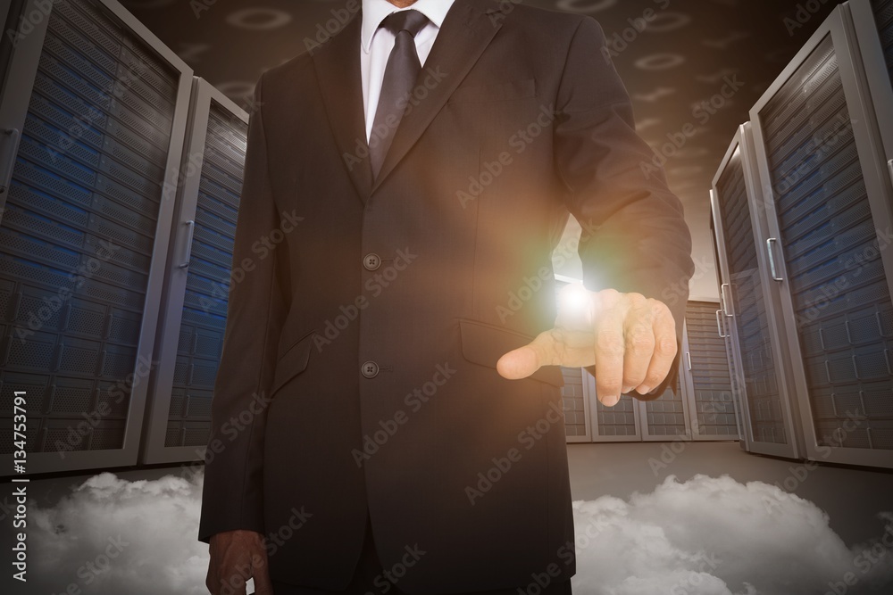 Composite image of businessman pointing